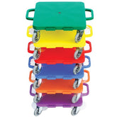 Colorful plastic dollies with wheels stacked together, displaying a variety of bright hues in a playful arrangement.